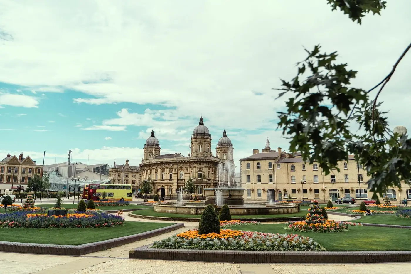 View of Hull Maritime Museum with colorful gardens in Kingston upon Hull, England.